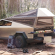 Illustration for article titled The Tesla Cybertruck's Tent Is The Best Car Tent Since The 2001 Pontiac Aztek